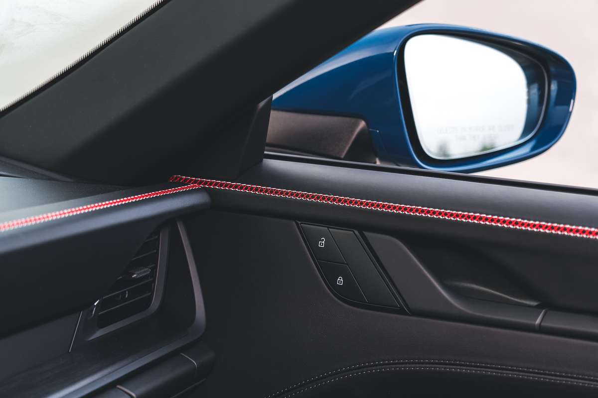 2023 Porsche 911 Carrera GTS Cabriolet interior red lines
